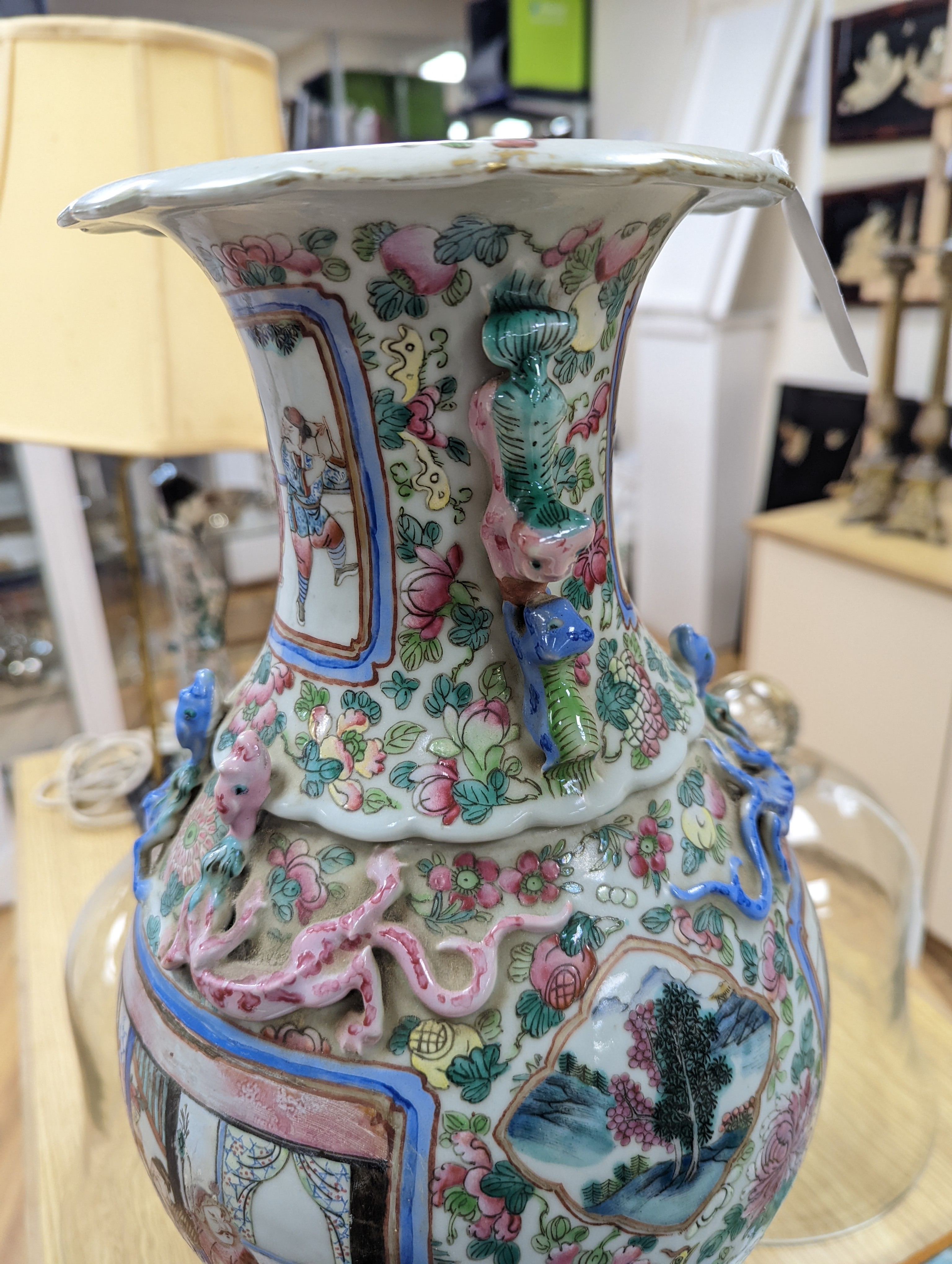 A large Chinese famille rose two handled vase, late 19th century, wood stand, restored 54cm incl stand